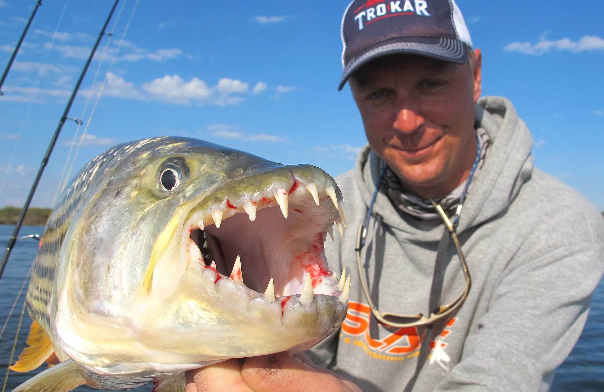 Fisherman posing with his catch
