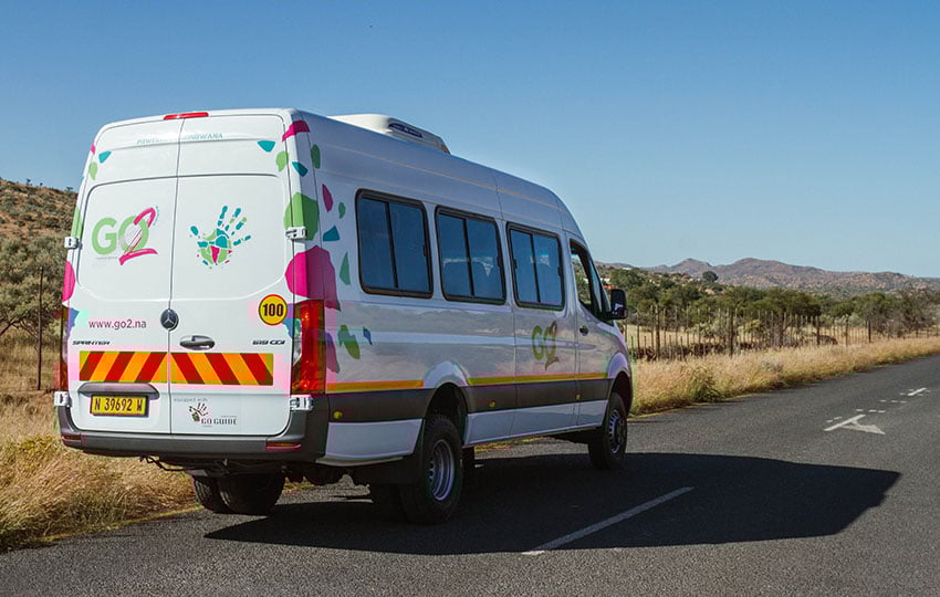 Go2 bus on road, Namibia