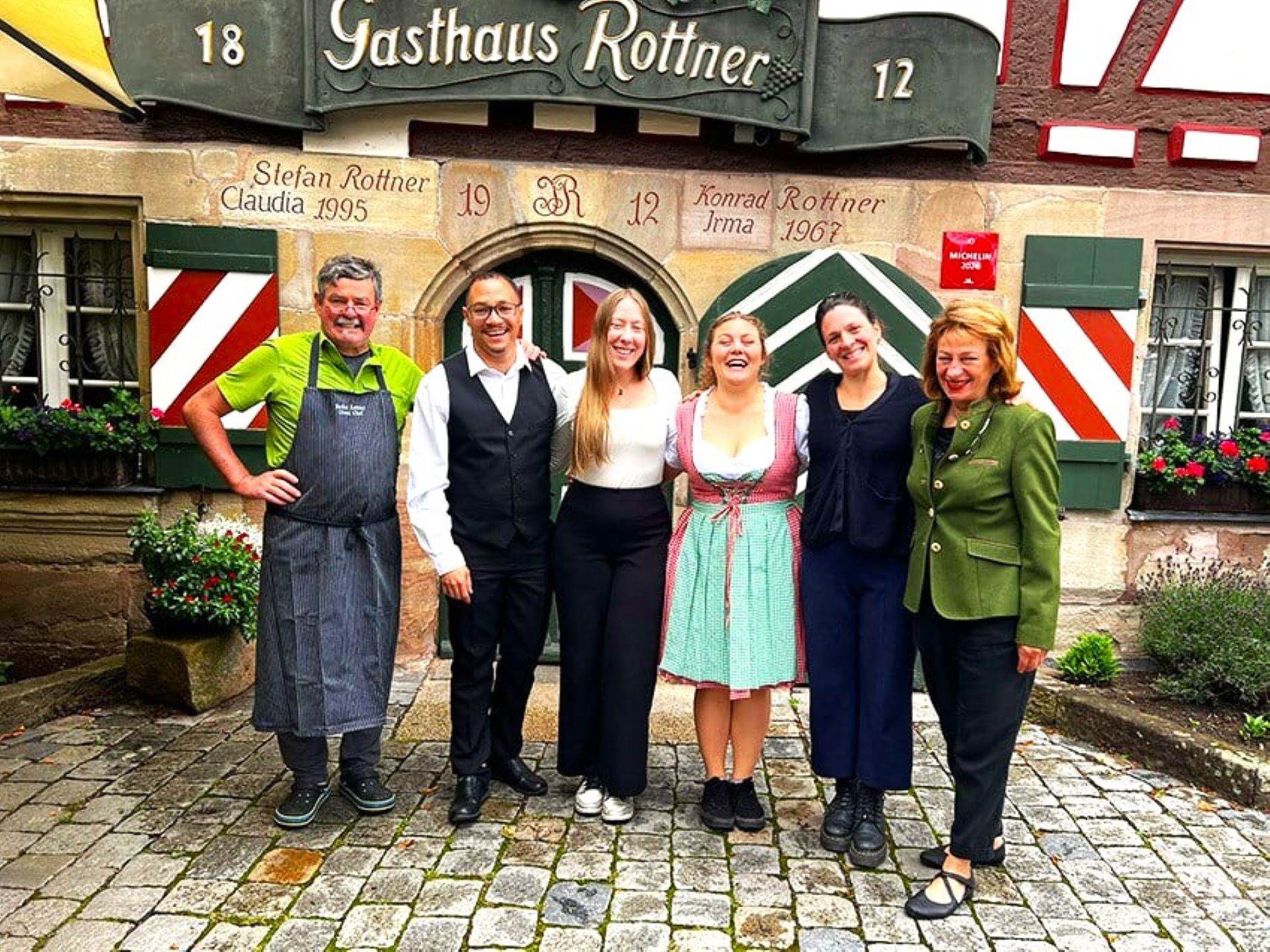 Christa-Marie and Algernon alongside their colleagues in Germany. 