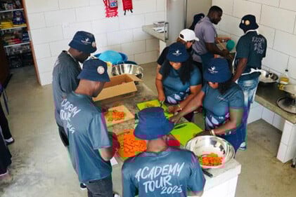 Namibians preparing food in kitchen