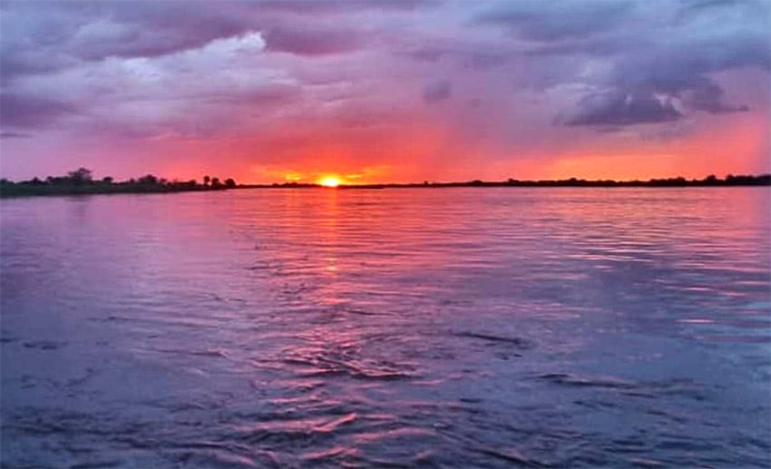 Sunset at Okavango River, Namibia